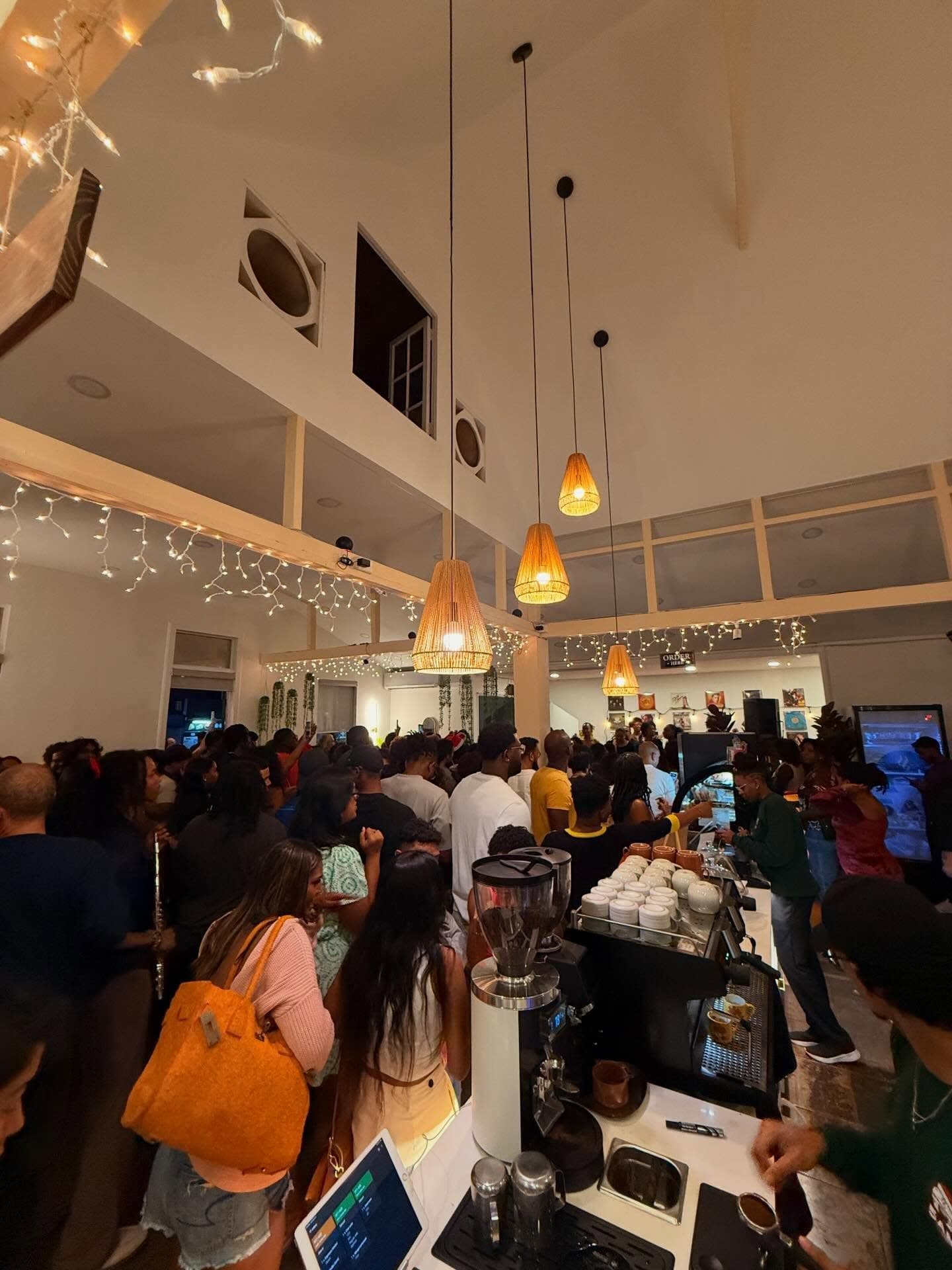 A packed evening inside 5AM Club Coffee on Carlos Street